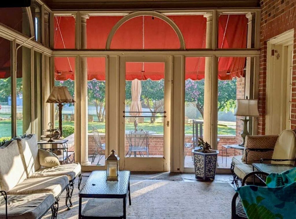 Screened in porch of Hornsby House Inn